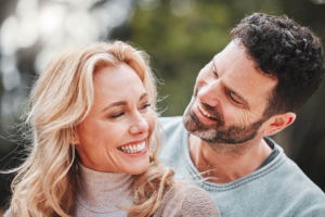 Smiling couple — EMSELLA® Chair for urinary incontinence at REDEEM